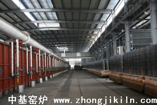 朝陽金麟鐵粉廠187米寬斷面金屬框架全纖維棉體海綿鐵隧道窯側(cè)面一角